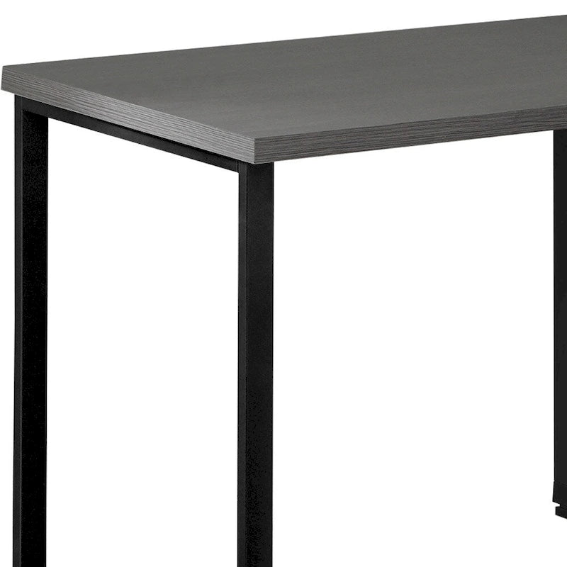Bureau d'ordinateur d'angle en bois gris et noir avec tiroirs et cadre en métal