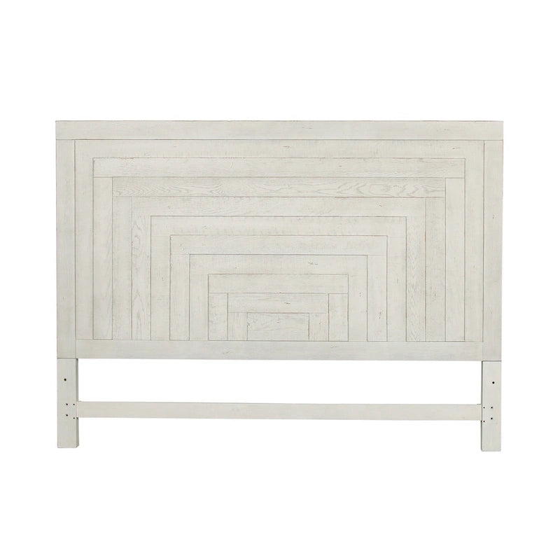 Lit plateforme queen en bois blanc vieilli avec tête de lit géométrique