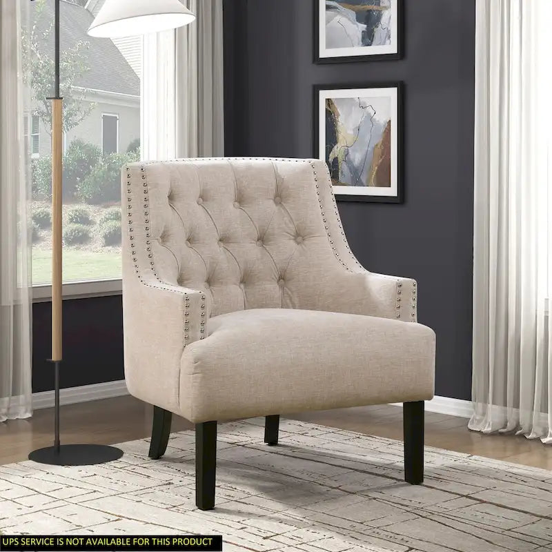 Fauteuil d'appoint capitonné avec garniture cloutée et pieds en bois massif
