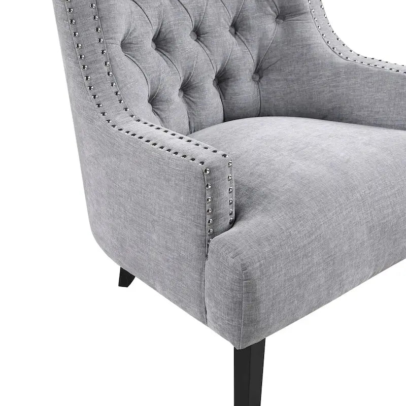 Fauteuil d'appoint capitonné avec garniture cloutée et pieds en bois massif